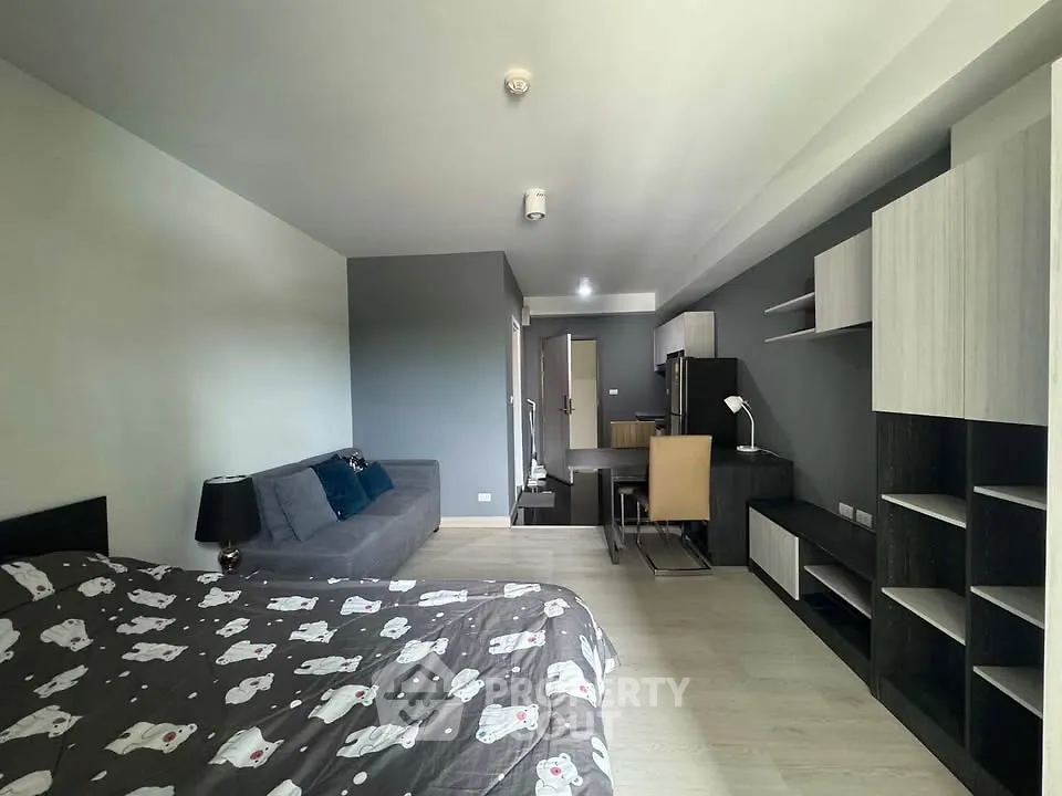 Modern studio apartment with stylish furniture and open layout