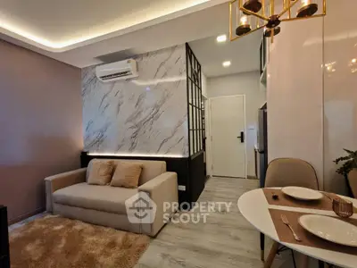 Modern living room with elegant decor and cozy dining area