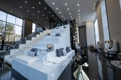 Luxurious modern living room with high ceilings and elegant decor