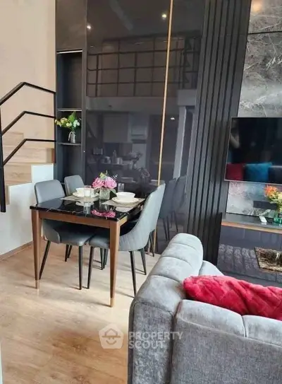 Modern living room with stylish dining area and elegant decor