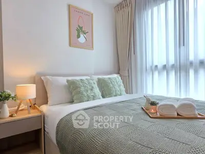 Cozy and stylish bedroom with soft lighting and elegant decor, perfect for relaxation and comfort.