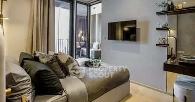 Luxurious modern bedroom with balcony access and stylish decor