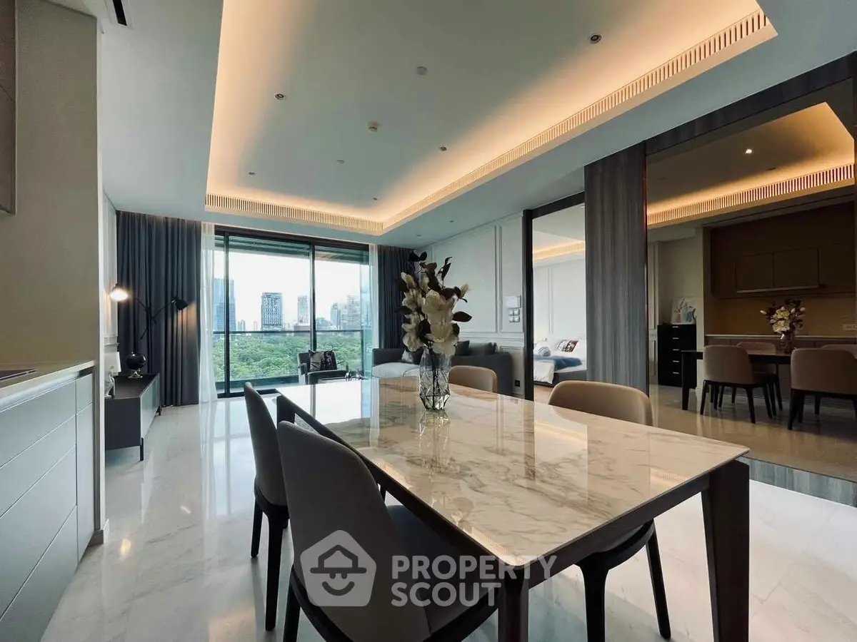Luxurious modern dining area with marble table and city view, perfect for elegant entertaining.