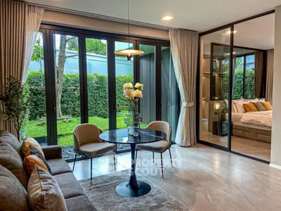 Luxurious living room with garden view and elegant decor