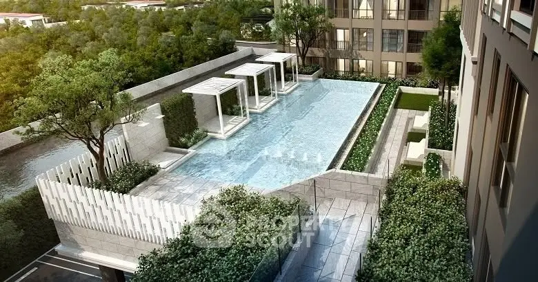 Luxurious rooftop pool with modern cabanas and lush greenery in a high-end residential complex.