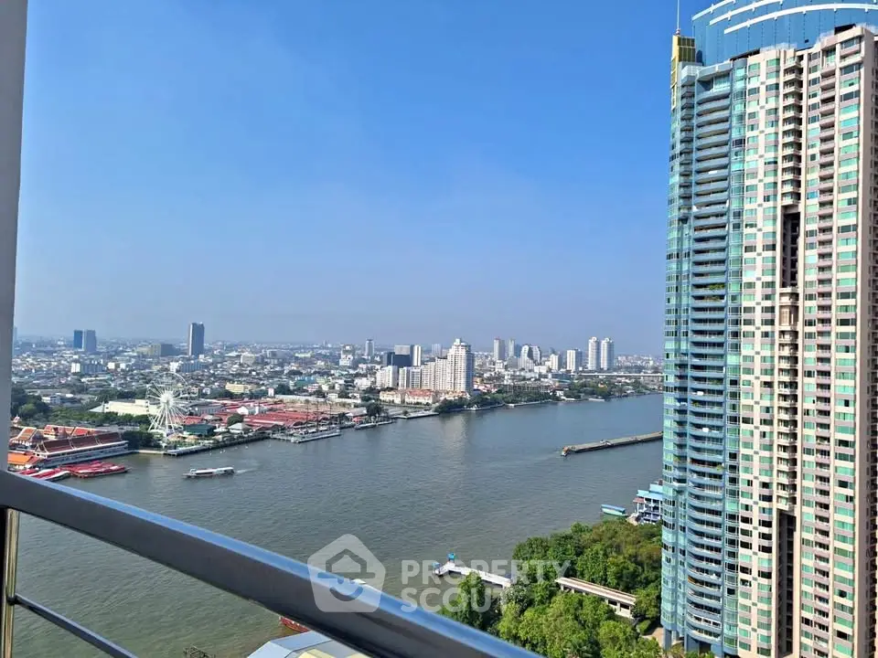 Stunning river view from high-rise balcony in urban cityscape