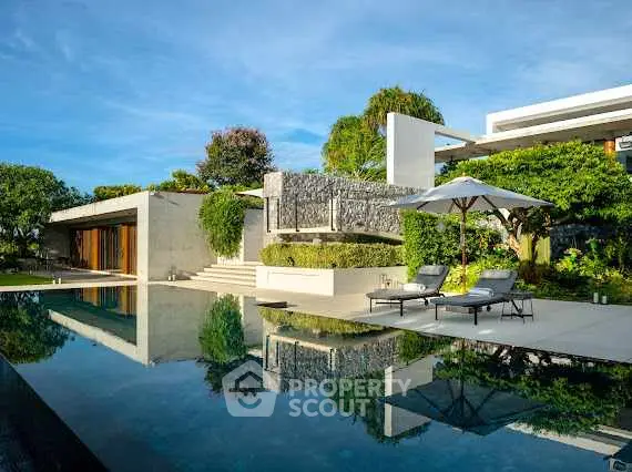 Luxurious modern villa with stunning pool and lush garden