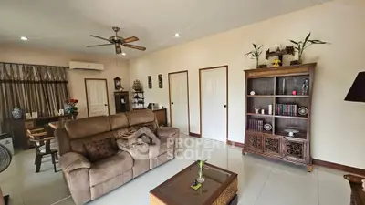 Spacious living room with elegant decor and comfortable seating