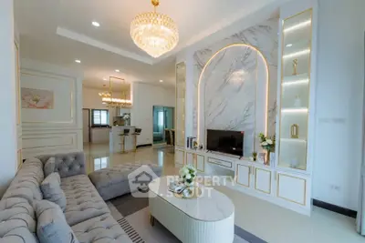 Luxurious living room with elegant chandelier and modern decor