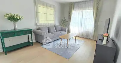 Bright and cozy living room with modern decor and natural light
