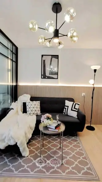 Stylish modern living room with elegant lighting and cozy decor