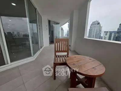 Spacious balcony with city view, perfect for relaxation and enjoying the skyline.