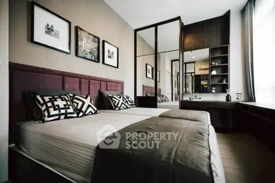 Luxurious modern bedroom with stylish decor and ample natural light