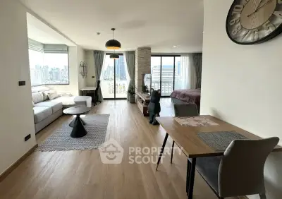 Spacious modern living room with city view and stylish decor