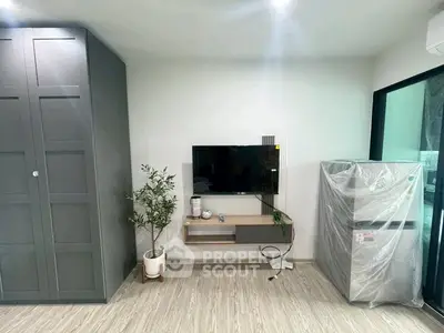 Modern living room with sleek TV setup and stylish storage solutions