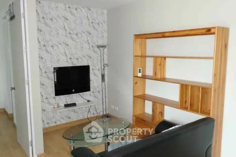 Modern living room with stylish decor and wooden shelving unit