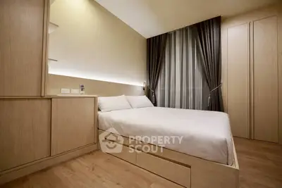 Modern bedroom with sleek wooden furniture and ambient lighting