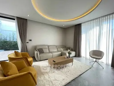 Modern living room with stylish furniture and elegant lighting