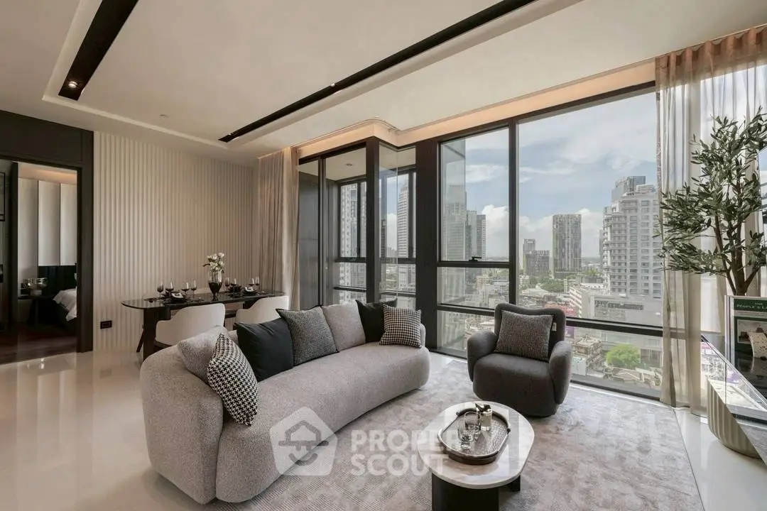 Luxurious modern living room with panoramic city views and elegant furnishings.