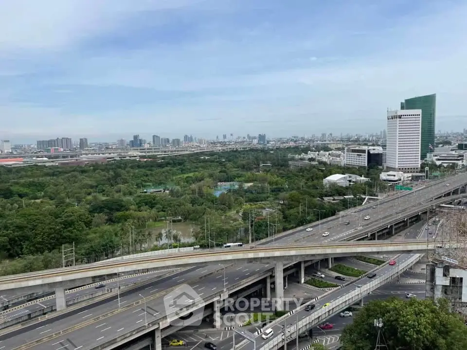 Stunning cityscape view with lush greenery and modern infrastructure, ideal for urban living enthusiasts.