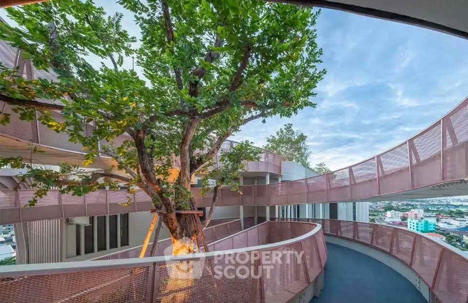 Stunning architectural design with tree integrated into modern building exterior