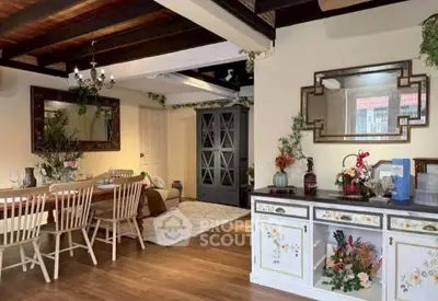Charming dining area with rustic decor and elegant wooden furniture in cozy home setting.