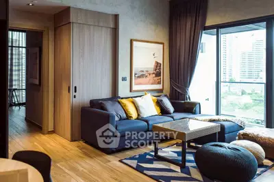 Modern living room with stylish decor and city view balcony