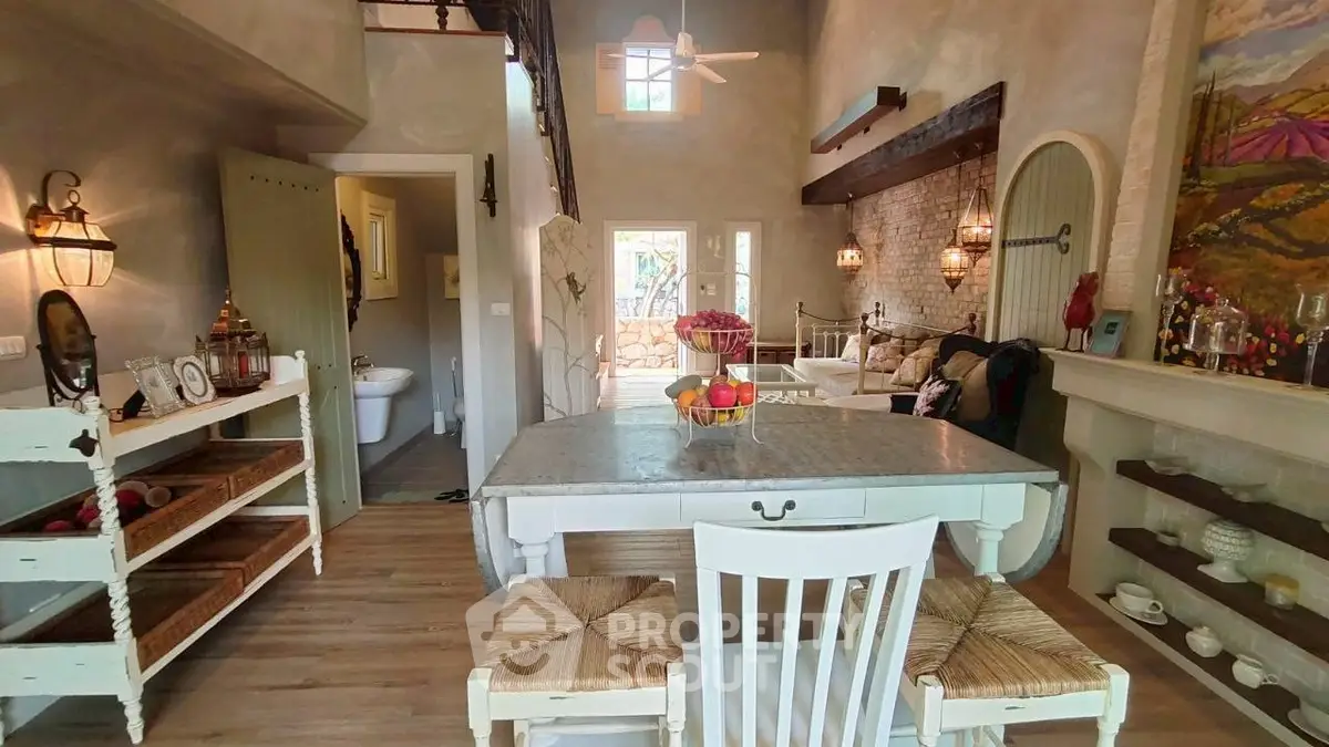 Charming rustic living room with high ceilings and cozy decor