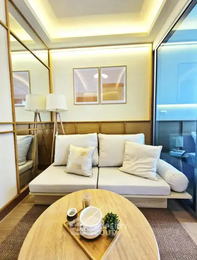 Modern living room with cozy sofa and stylish decor