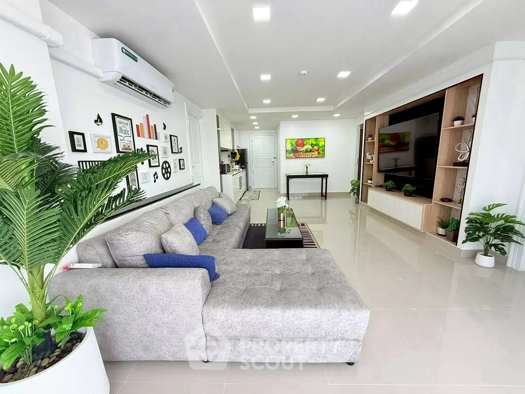Spacious modern living room with stylish decor and large sectional sofa