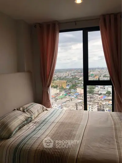 Cozy bedroom with panoramic city view from high-rise window, featuring elegant curtains and stylish bedding.
