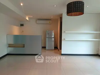 Spacious modern living room with sleek design and air conditioning