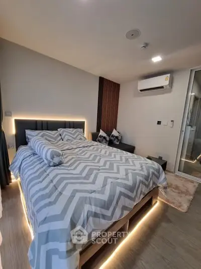 Modern bedroom with stylish lighting and cozy decor