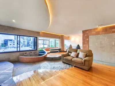 Luxurious living room with panoramic windows and unique architectural design
