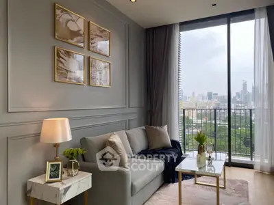 Modern living room with elegant decor and city view from large windows.