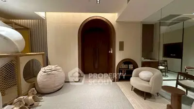 Luxurious modern living room with unique play area and elegant decor