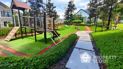 Charming residential playground with lush greenery and modern play equipment