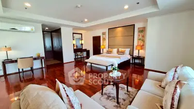 Luxurious spacious bedroom with elegant wooden flooring and stylish decor