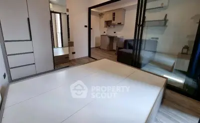 Modern minimalist bedroom with sleek design and ample storage space