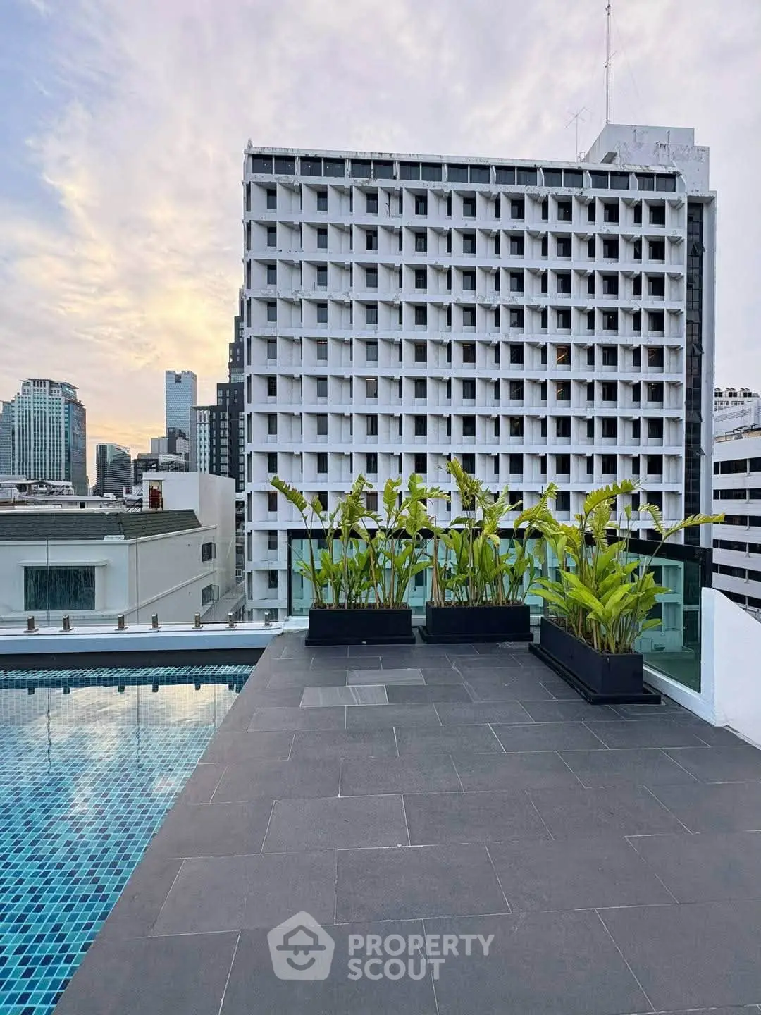 Stunning rooftop pool with city skyline views and modern design.