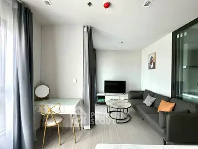 Modern living room with stylish furniture and natural light