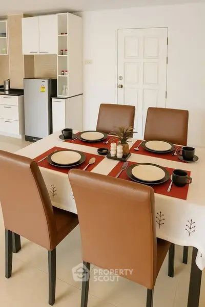 Modern dining area with stylish table setting in a contemporary kitchen space.
