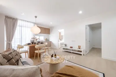 Spacious modern living room with open kitchen and stylish decor