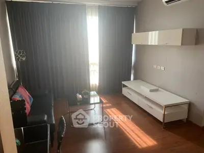 Modern living room with sleek furniture and natural light