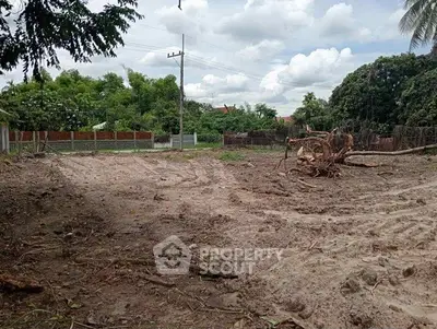 Spacious cleared land plot ready for development in a serene neighborhood.