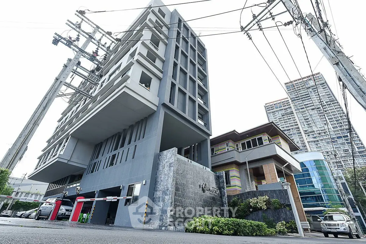 Modern urban building with unique architecture and street view