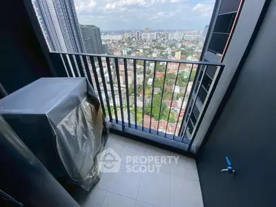High-rise balcony with stunning city view, perfect for urban living.