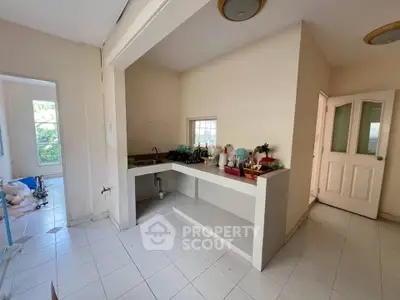 Spacious kitchen area with open layout and natural light