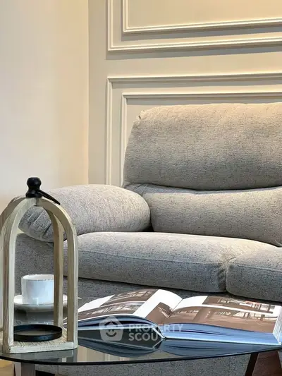 Cozy living room with plush sofa and stylish decor