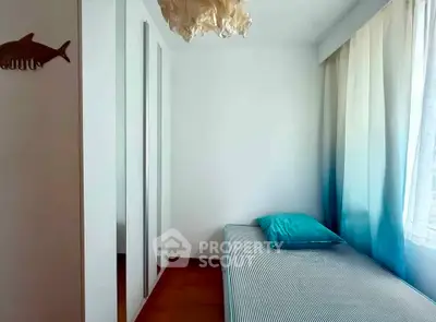 Cozy minimalist bedroom with single bed and stylish decor
